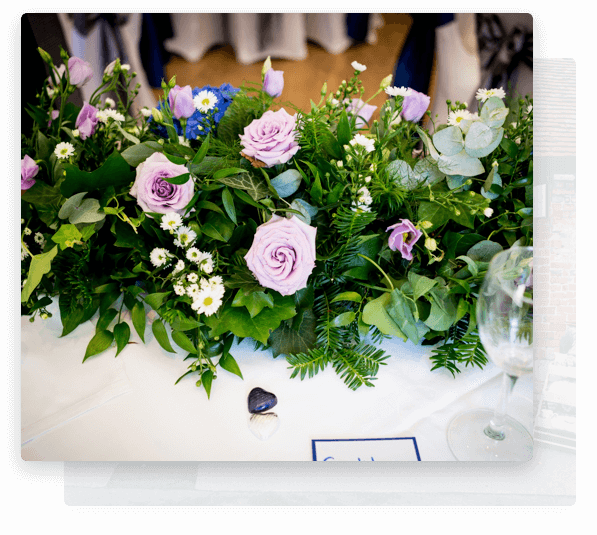 wedding florist hampshire providing purple wedding flowers for a ceremony. 